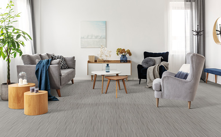 living room with white walls and carpet floors